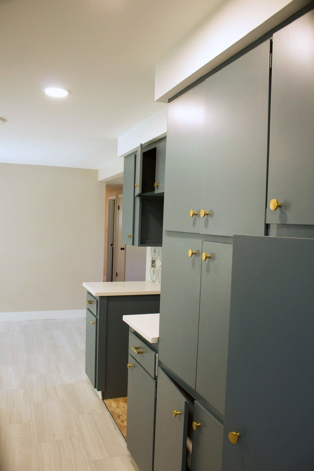Tall green painted pantry cabinets in Windsor